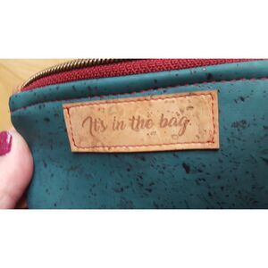 It's in the BAG Cork  Coin purse, Blue with red‎ interior, zipper closure